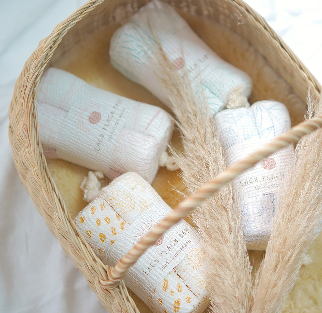 Baby GOTS organic cotton muslin cloth gift sets in Moses basket