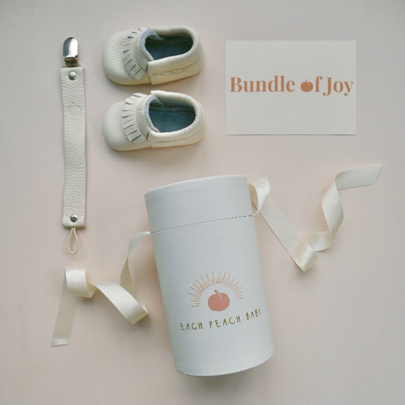 Style baby gift box with ivory soft sole Fawn baby shoes and matching organic leather dummy clip in ivory