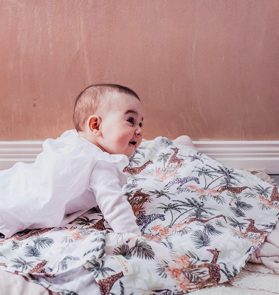 Organic cotton baby muslin swaddle in jungle print