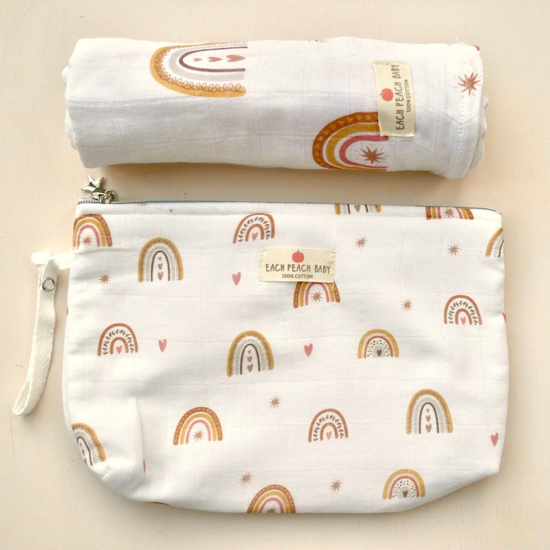 Rainbow print nappy pouch and matching muslin swaddle
