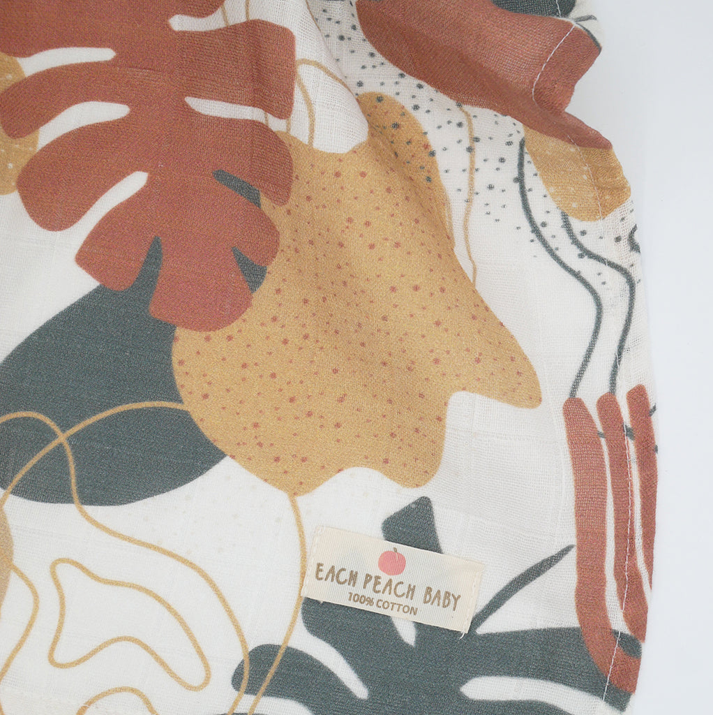 GOTS organic cotton baby muslin cloth swaddle in unisex botanical leaf print