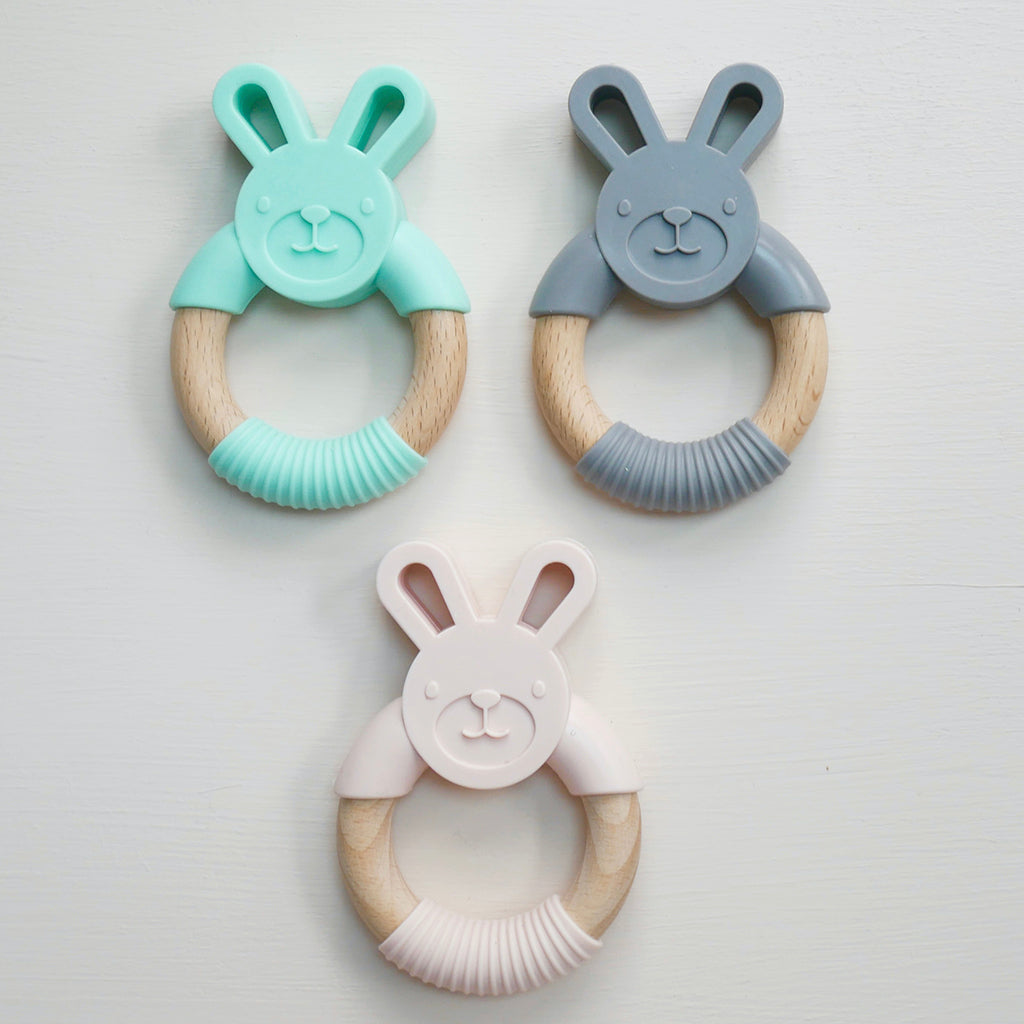 Bunny rabbit shaped baby ring teether made from BPA free silicone and natural beech wood 