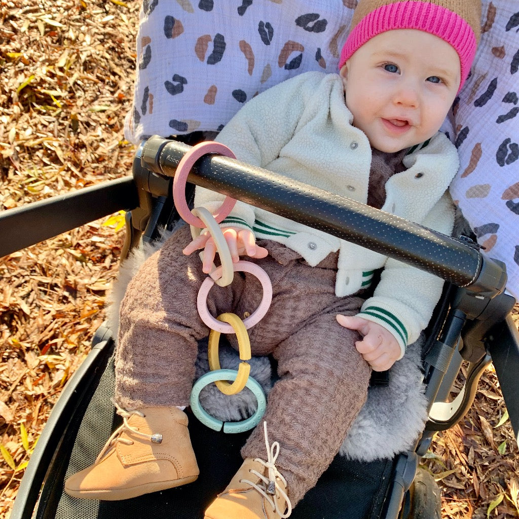 Lovely Links Teething Rings on pram